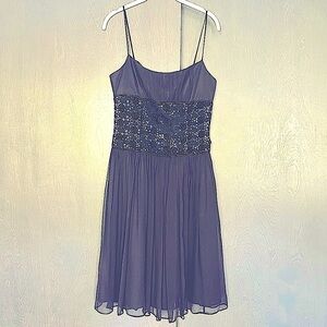 Beautiful pleated silk dress Size 8. Worn once.